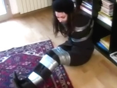 Girl Tape Tied On Floor